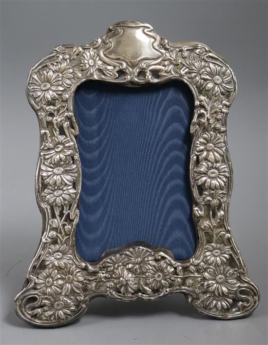 An Edwardian repousse silver mounted photograph frame, Chester, 1903,